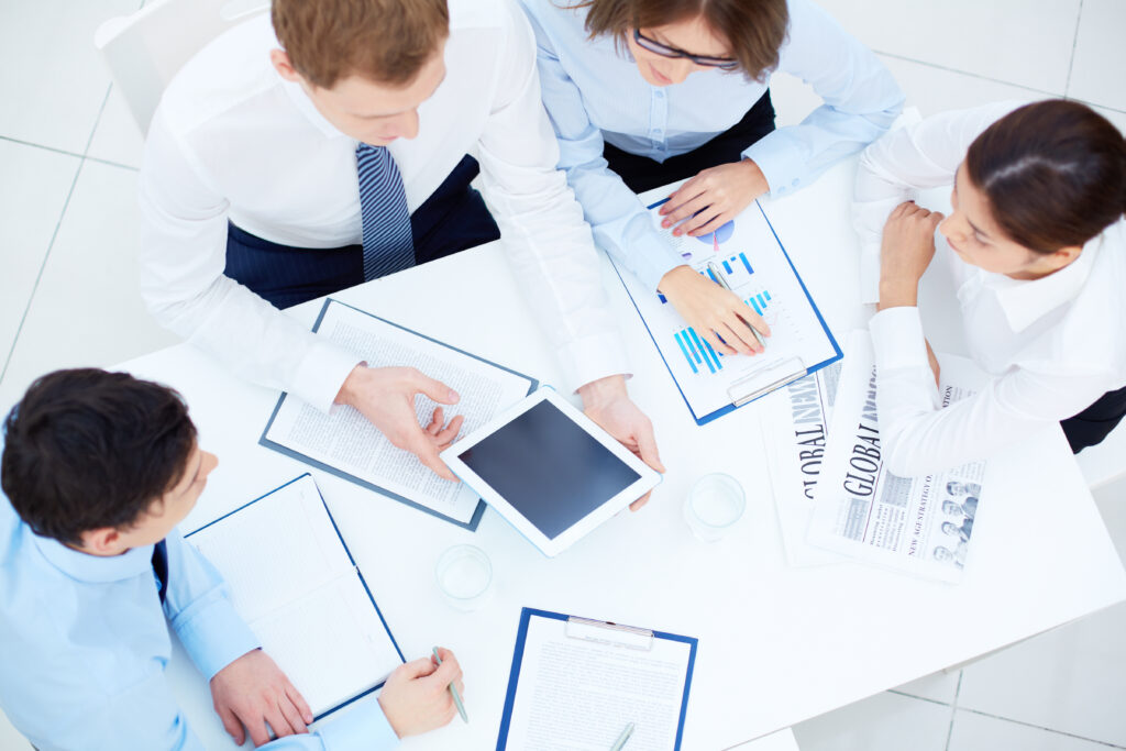 Top view of businesspeople paying attention.