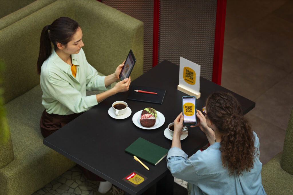 high-angle-friends-reading-menu-restaurant