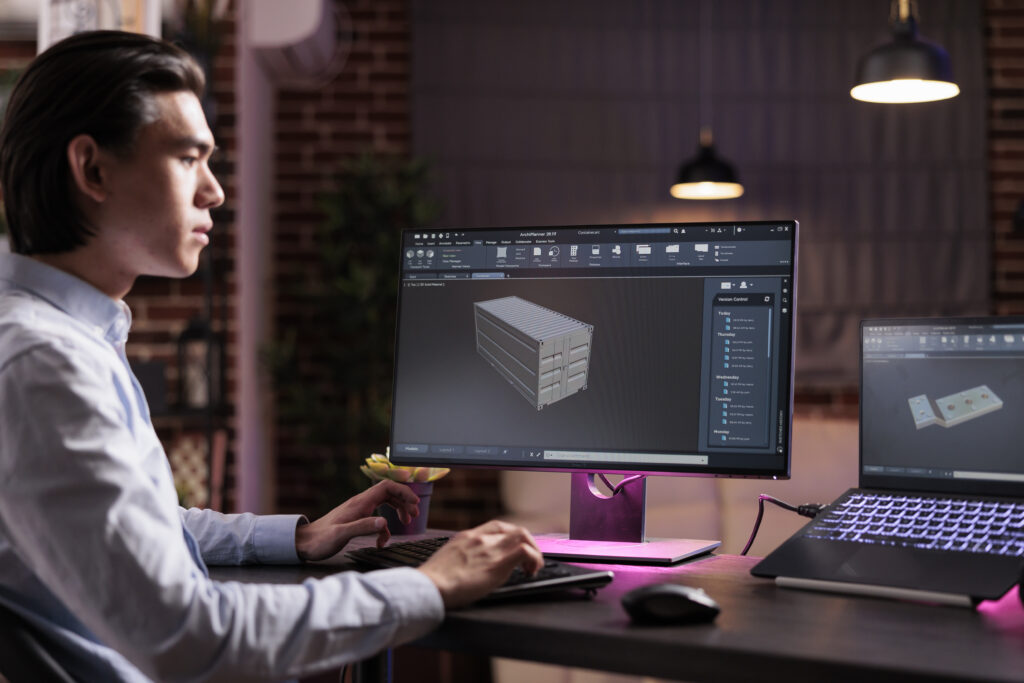 Machinery developer manufacturing industrial product on cad engineering software, developing advanced engine component. Creating technical machine for industry production with pc interface.